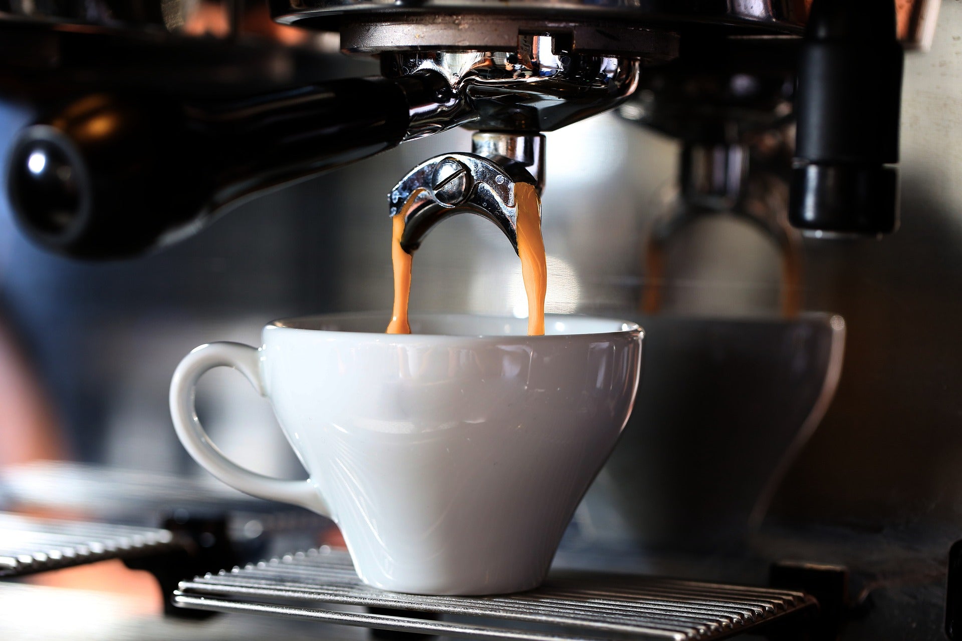 A barista pulling espresso at Groundwork